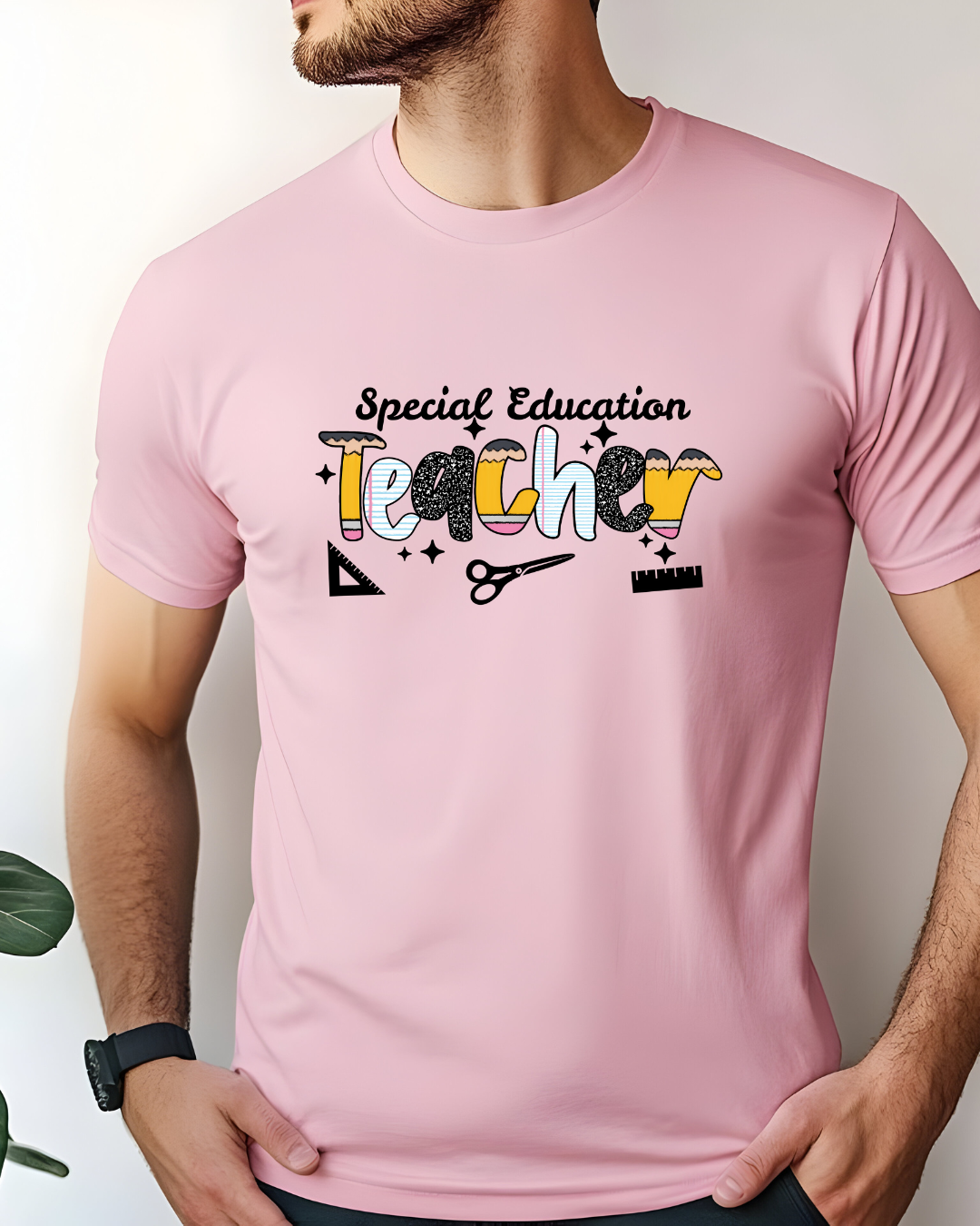 Person wearing a pink t-shirt with 'Special Education Teacher' text and graphics.