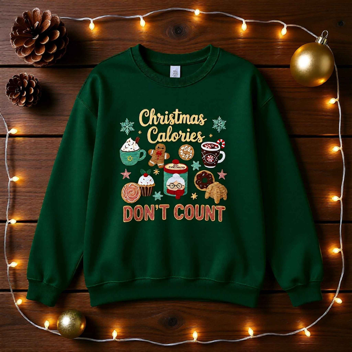 Flat lay of “Christmas Calories Don’t Count” Holiday Baking Faux Crochet Crewneck Sweatshirt