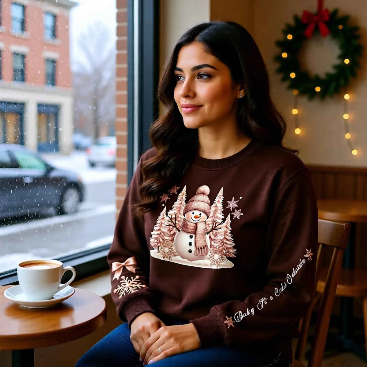 Woman wearing a Snowman Winter Collection “Baby It’s Cold Outside” sleeve text design. Cozy Christmas Crewneck Sweatshirt