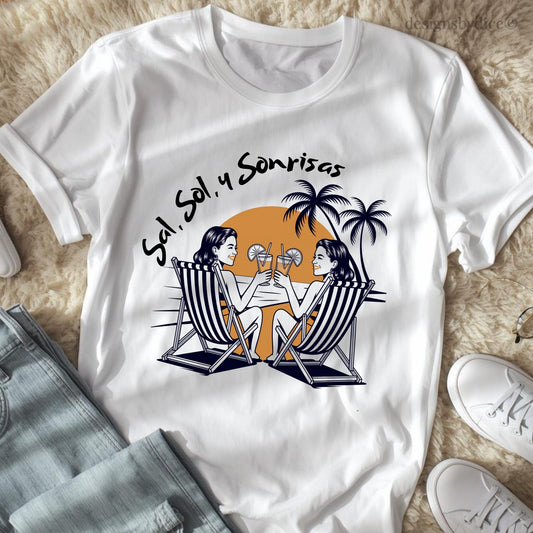 White t-shirt with a graphic design of two people in beach chairs, palm trees, and text on a textured surface.