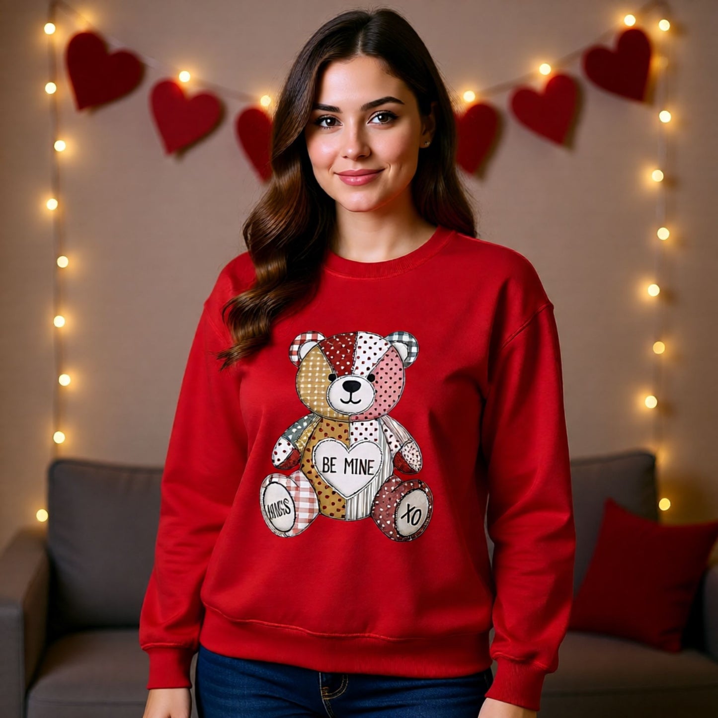 Red Valentine sweatshirt decorated with patchwork teddy bear holding heart and charming stitched details.