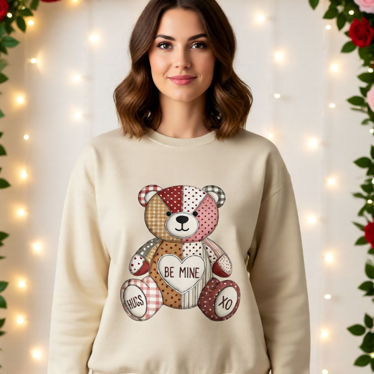 Cream crewneck sweater featuring cute patchwork teddy bear with hearts and Valentine sayings.