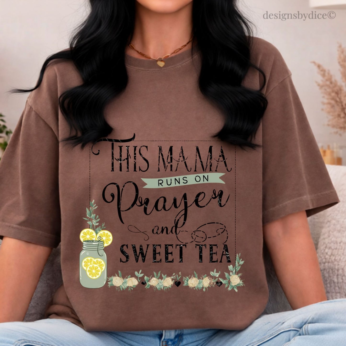 Person wearing a espresso t-shirt with text and graphics, sitting indoors.