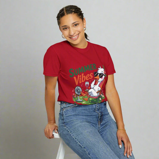 Person wearing a red 'Summer Vibes' t-shirt with a cartoon character on a white background