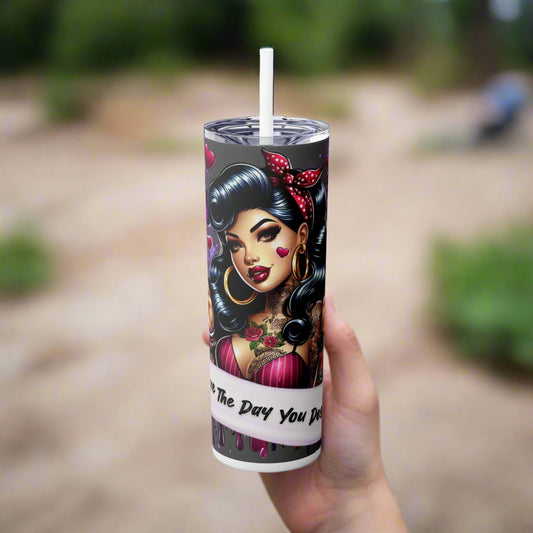 Tumbler with a design of a woman's face and text on a white background