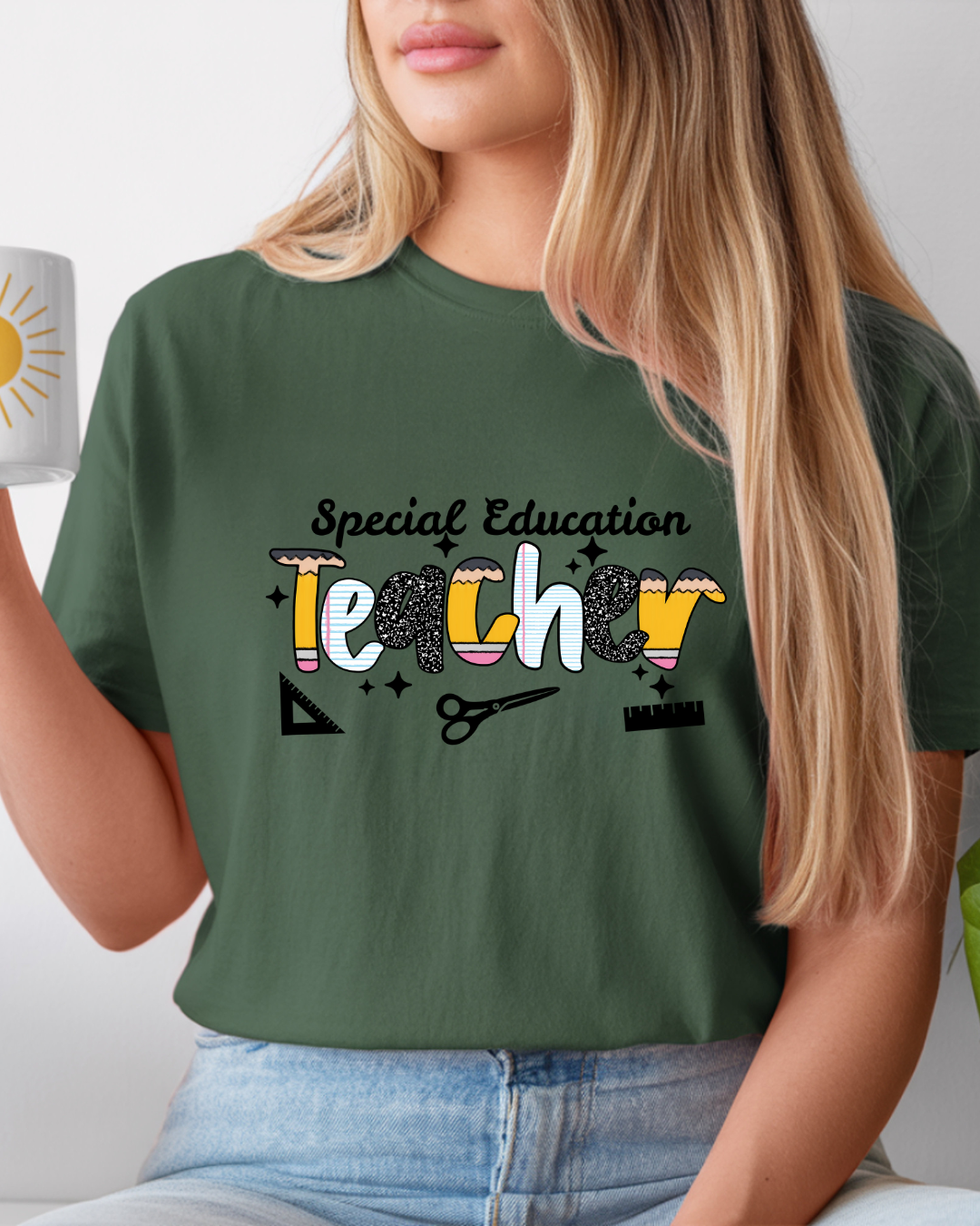 Person wearing a green t-shirt with 'Special Education Teacher' text and graphics.