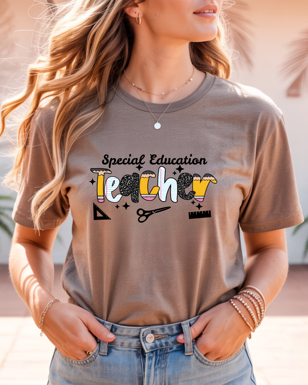 Person wearing a brown t-shirt with 'Special Education Teacher' text and graphics.