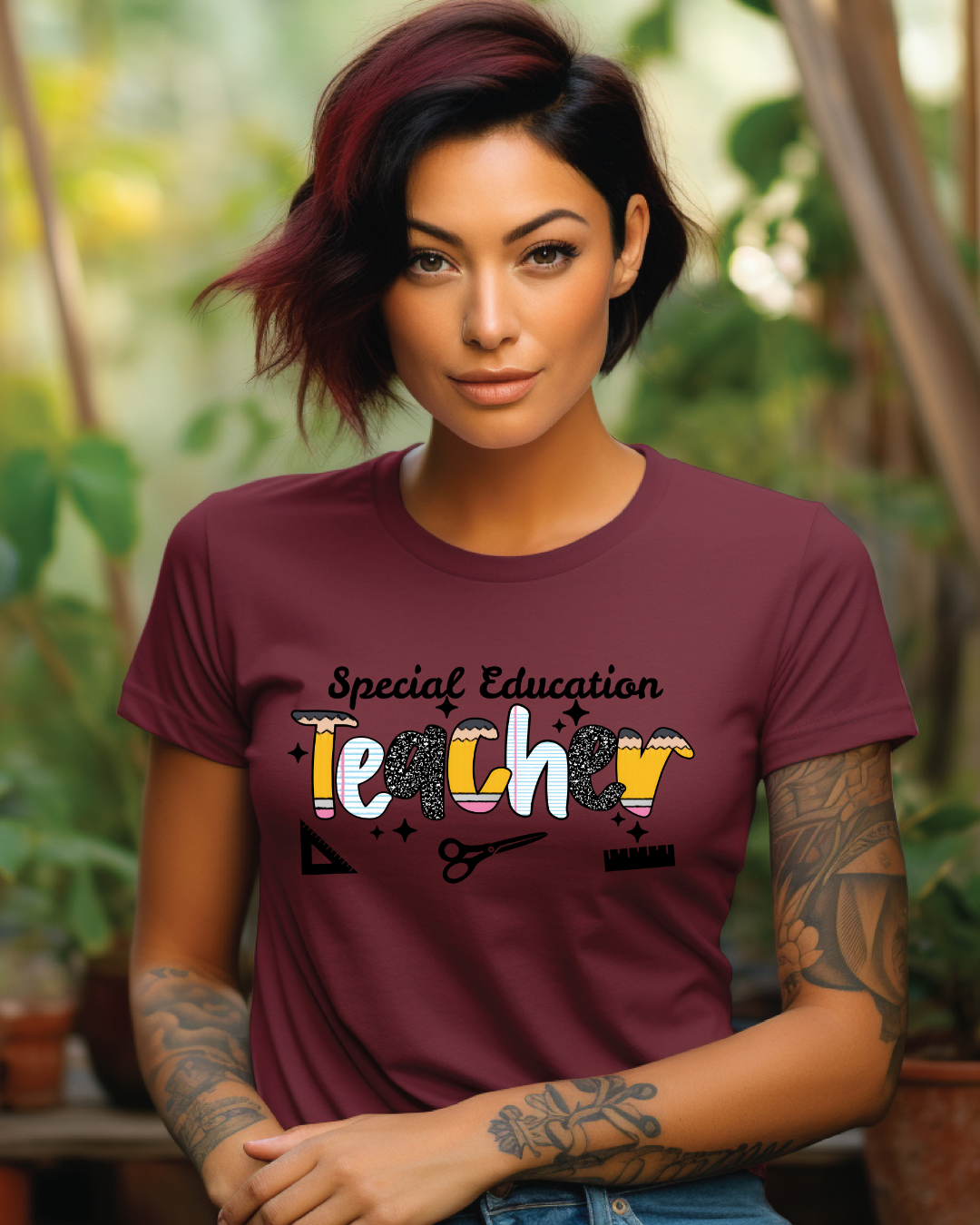 Person wearing a maroon t-shirt with 'Special Education Teacher' text
