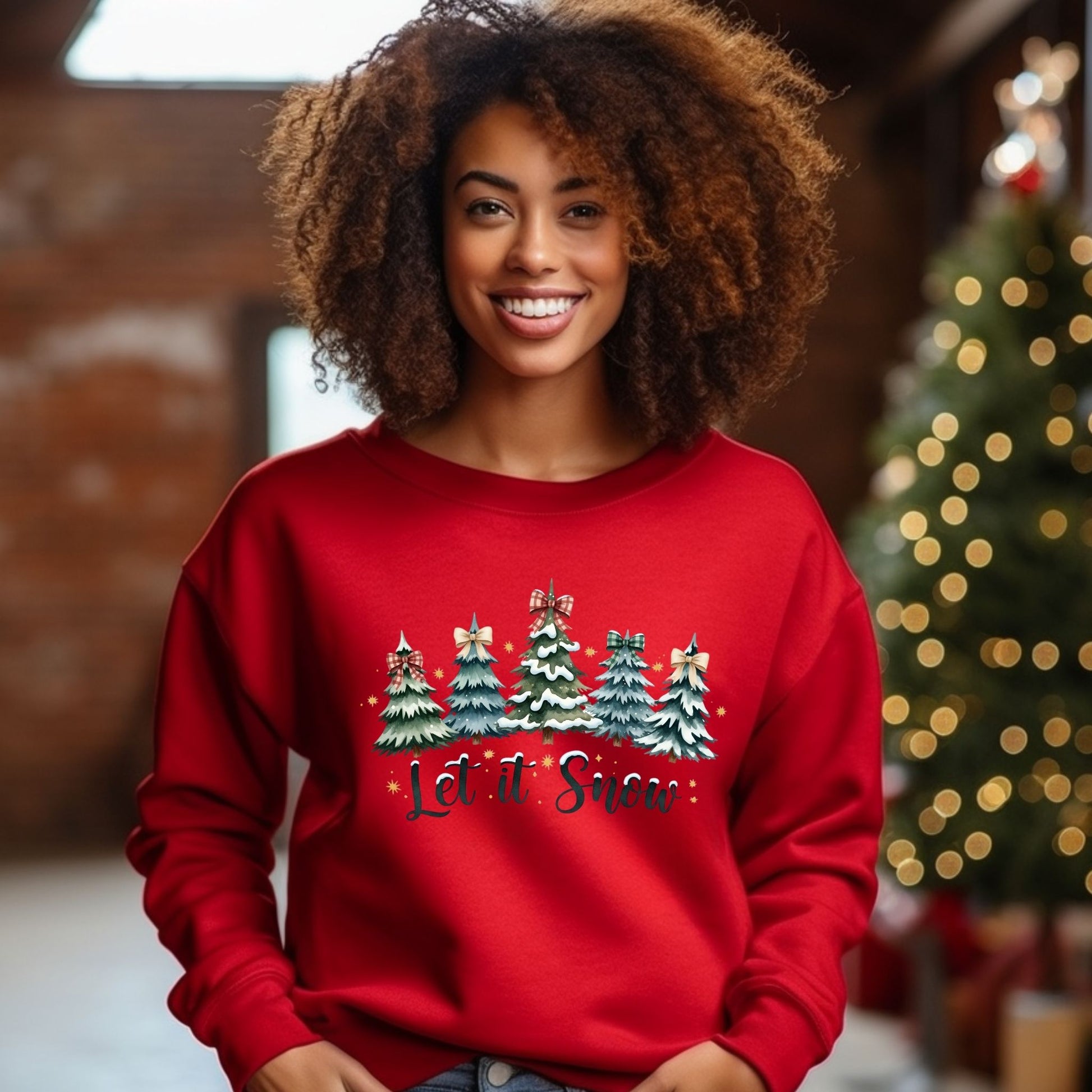 Person wearing a red 'Let it Snow' Christmas sweater with a blurred festive background