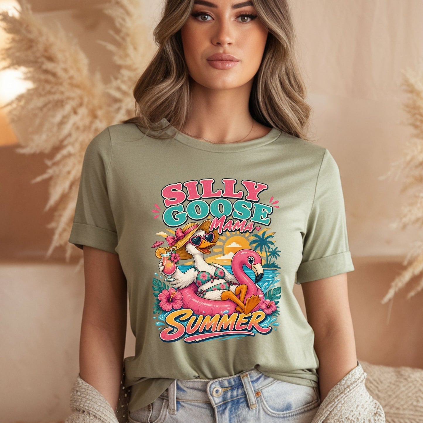 Woman wearing a bay colored comfort colors tshirt with a silly goose mama summer graphic design