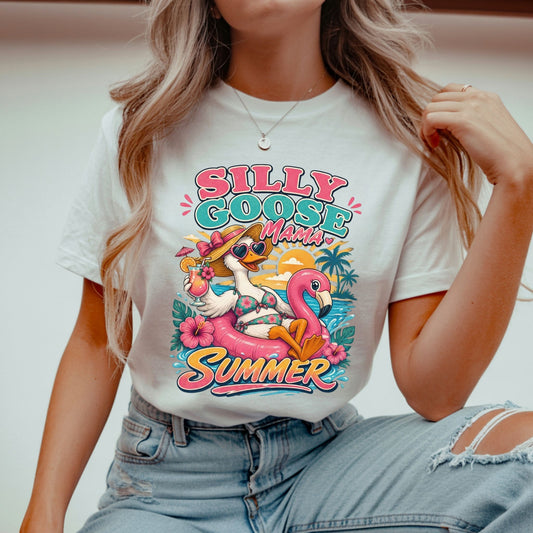 Woman wearing a white comfort colors tshirt with a silly goose mama summer graphic design