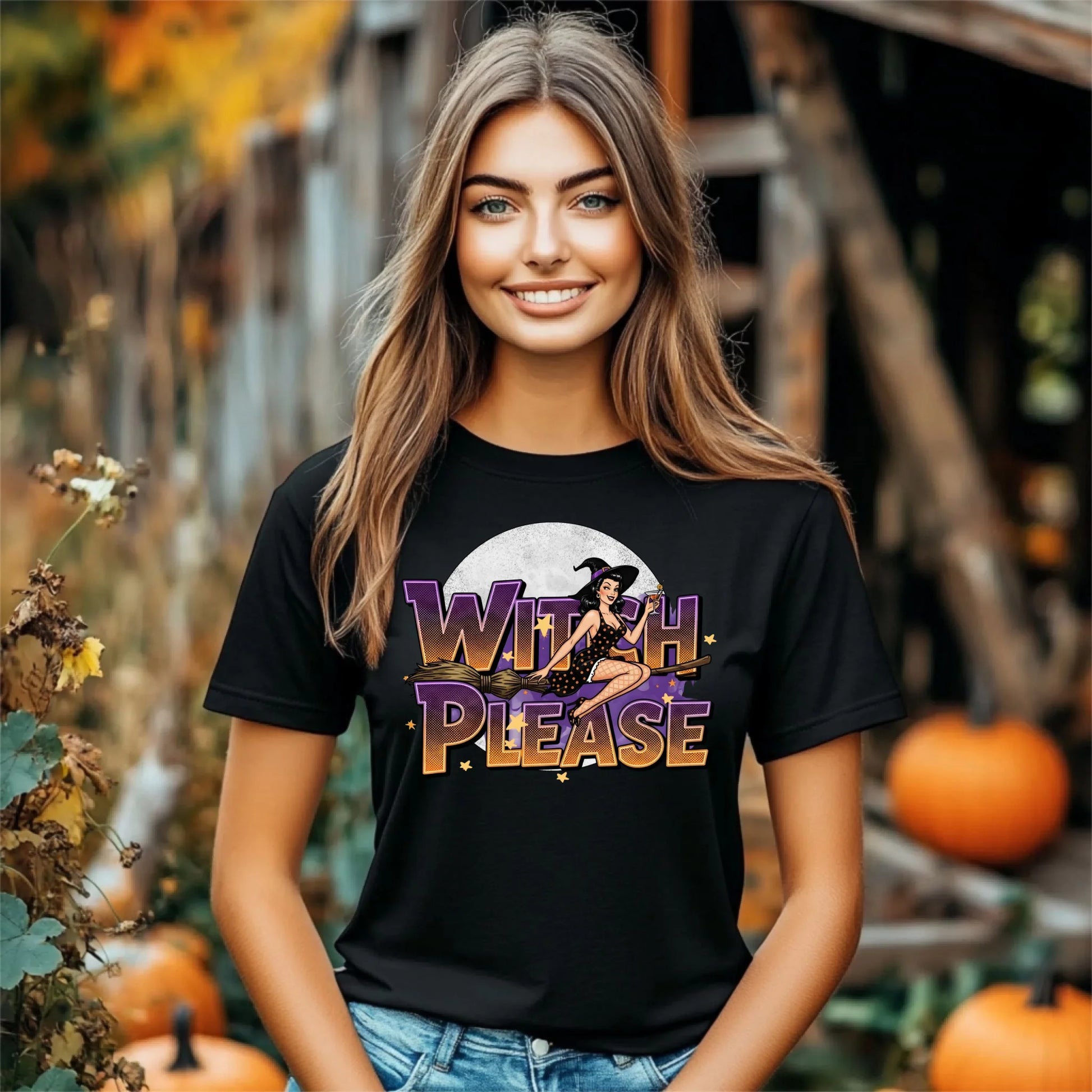 Woman wearing a black t-shirt with 'Witch Please' graphic in an autumn setting.