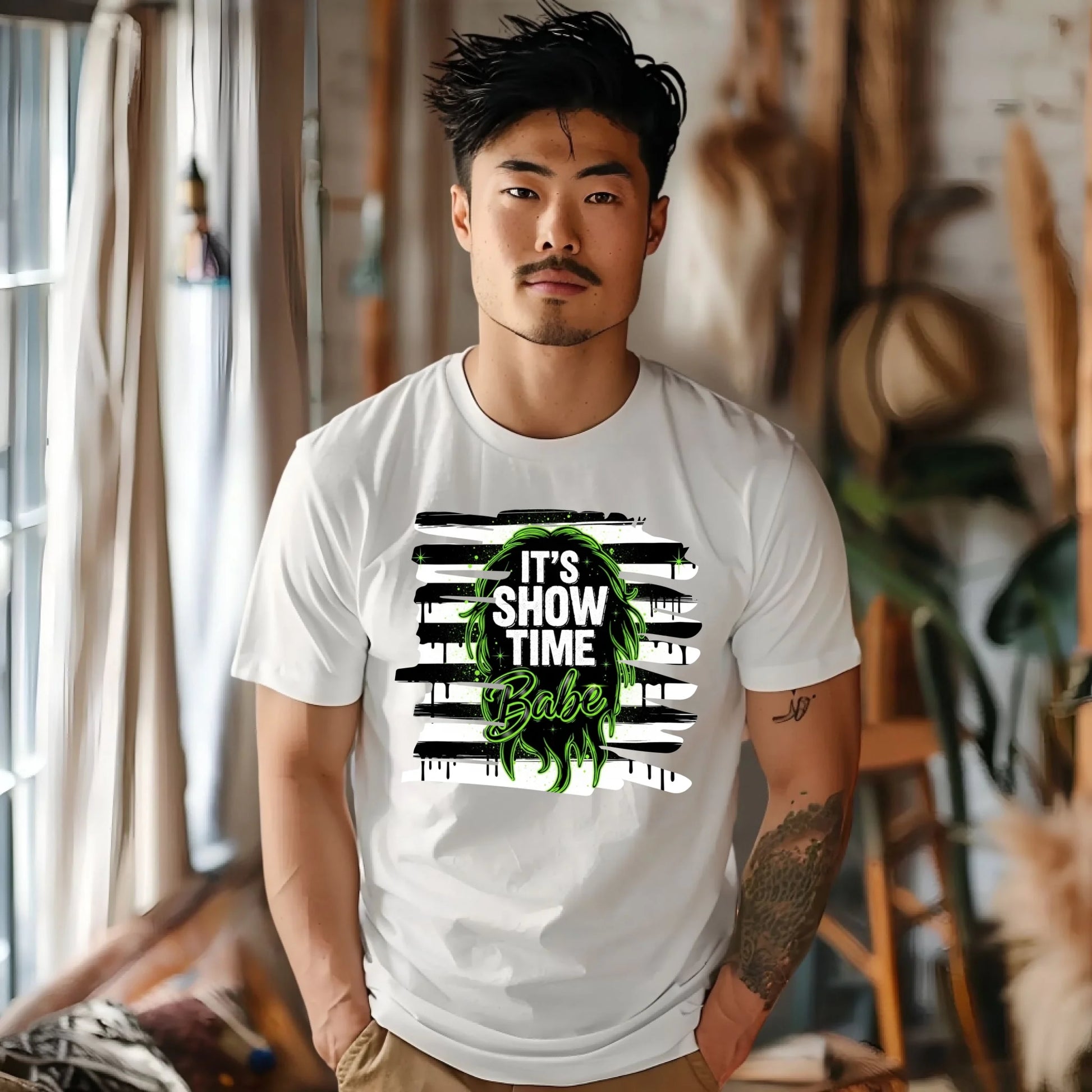 Man wearing a white t-shirt with a graphic design and text in a casual indoor setting