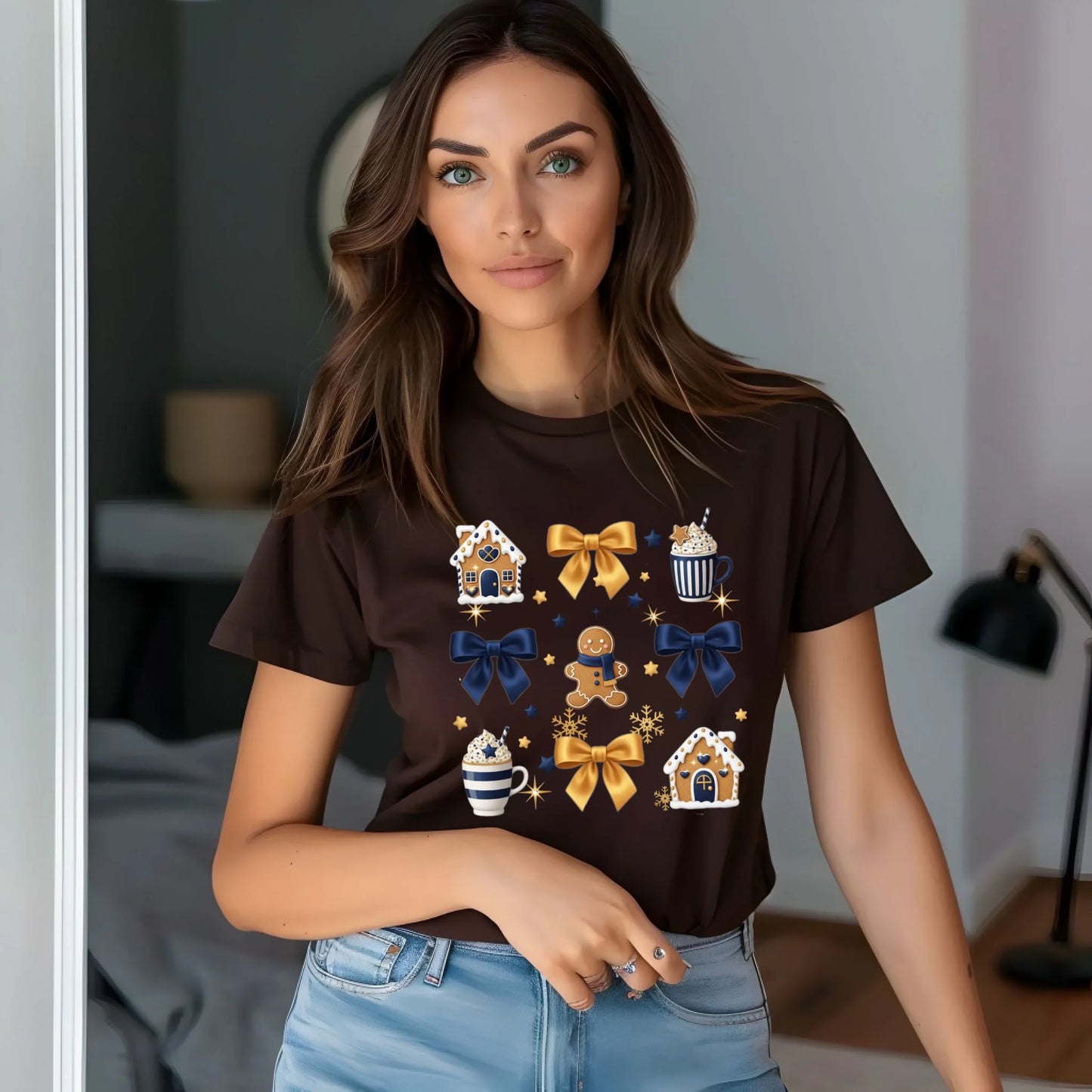 Woman wearing a brown t-shirt with decorative graphics in a casual setting