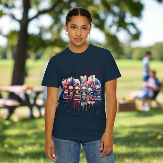 Person wearing a navy blue t-shirt with graphic design on a white background