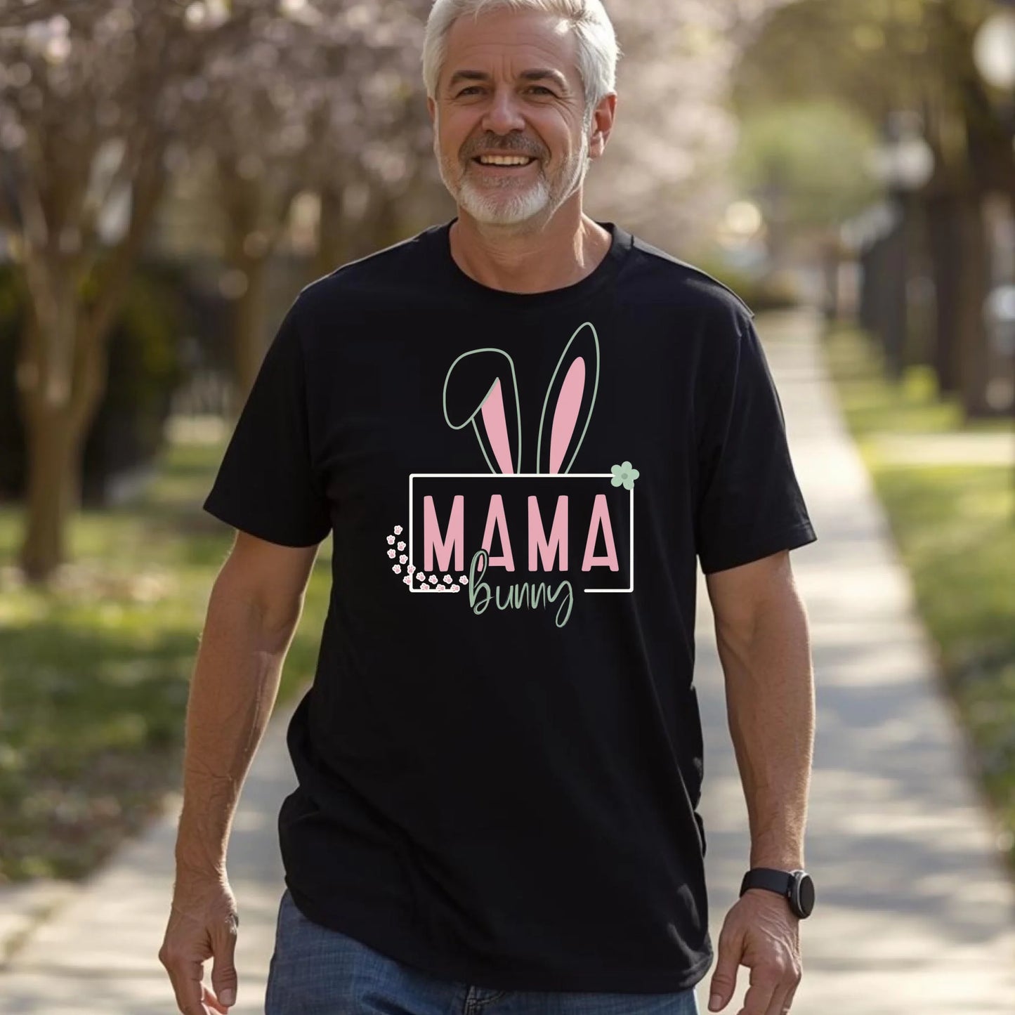 Adult wearing a black Easter bunny mama family t-shirt outdoors in natural daylight.