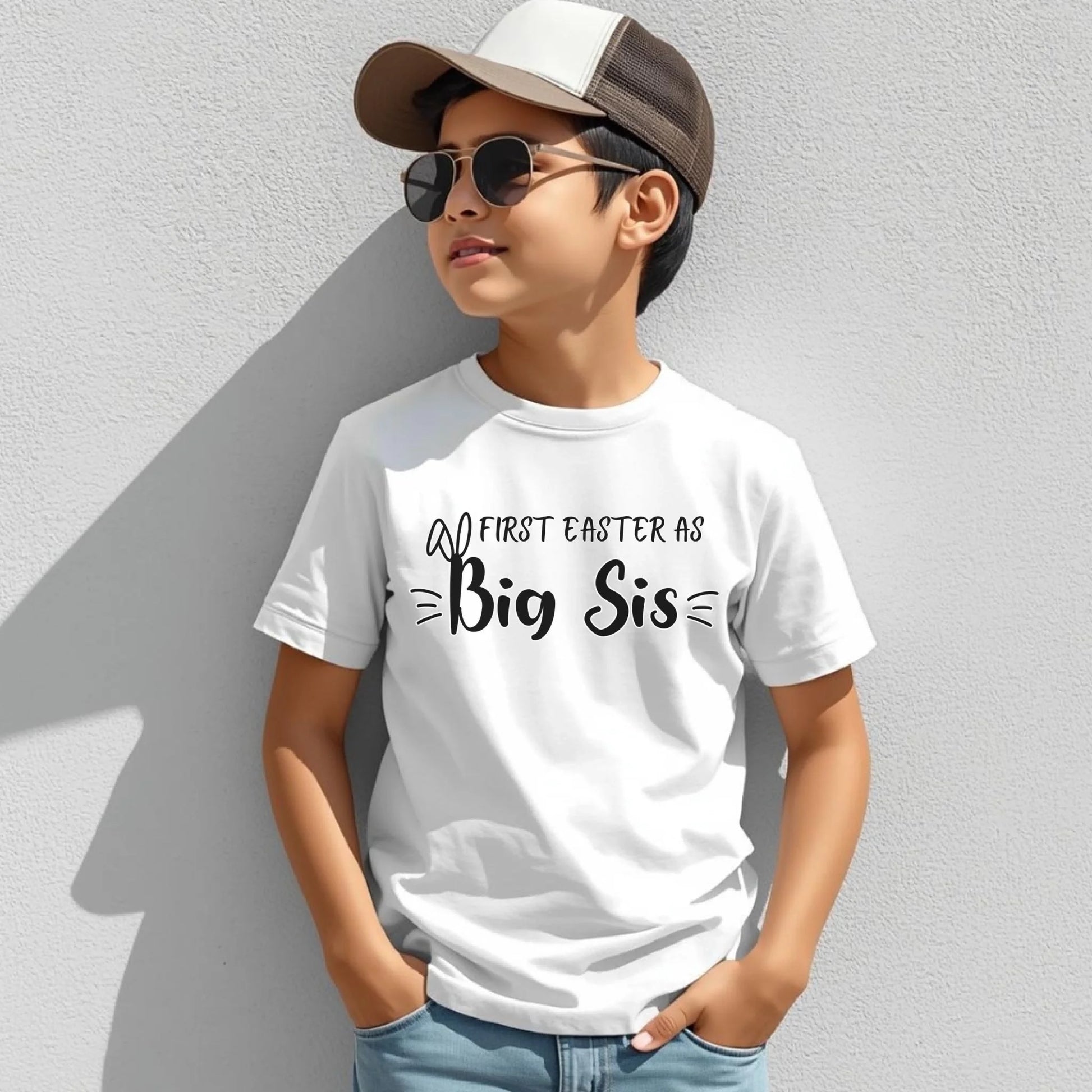 Youth white Bella Canvas t-shirt with “First Easter as Big Bro” design, perfect for sibling Easter outfits and family photos.