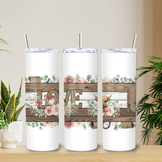 Rustic western tumbler wrap featuring wooden LOVE letters with florals, twine, and a baby Highland cow in blush pink valentine colors.