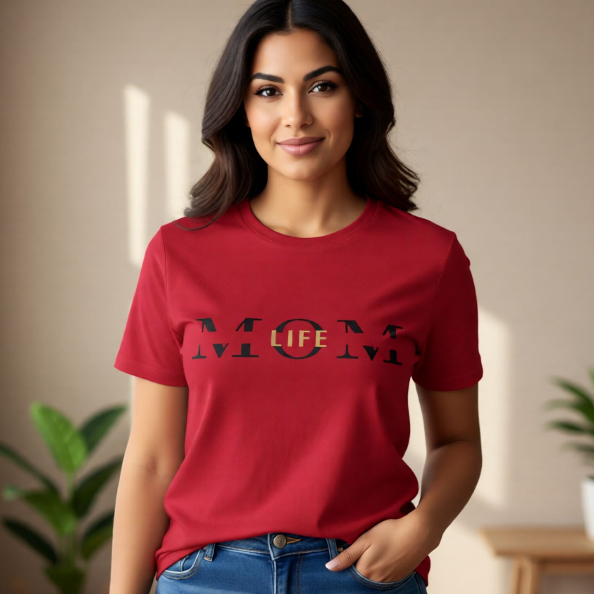 Studio mockup of a model wearing a red Mom Life t-shirt with minimalist lettering and a modern fit.