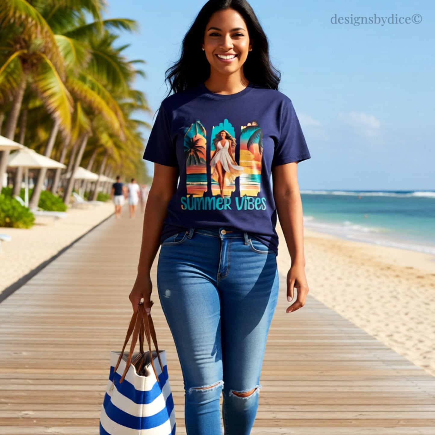 Woman wearing a 'Summer Vibes' t-shirt on a beach boardwalk with palm trees and ocean in the background.