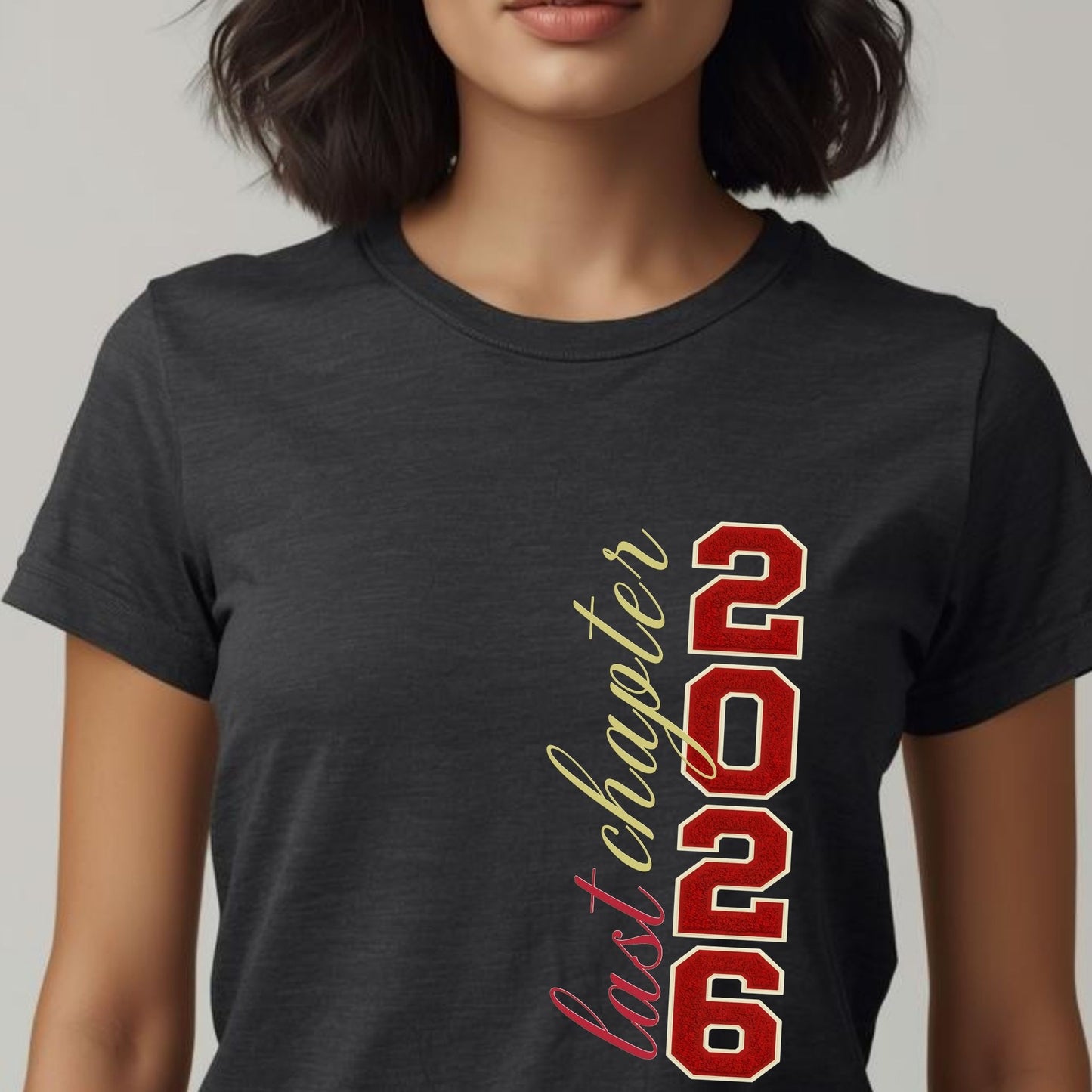 Person wearing a black t-shirt with 'last chapter 2026' design on a plain background
