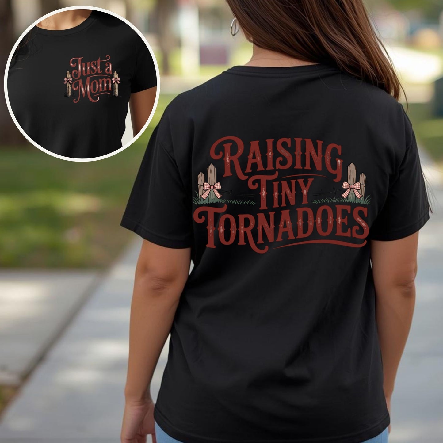 Person wearing a black t-shirt with 'Raising Tiny Tornadoes' text, outdoors.