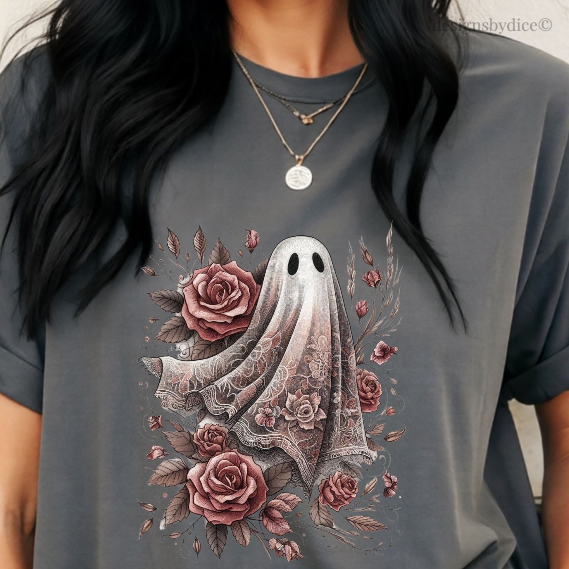 Gray t-shirt with a ghost and floral design worn by a person