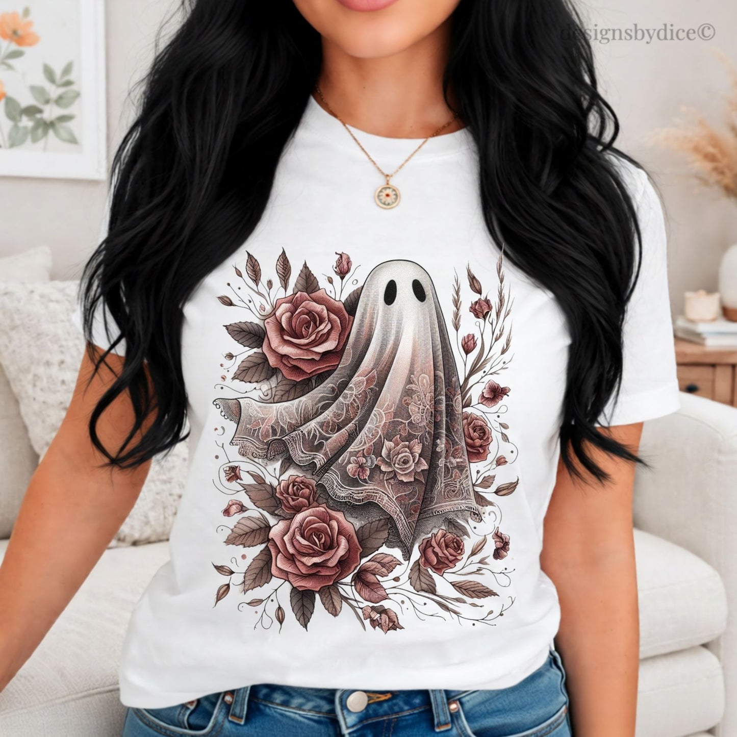 Person wearing a white t-shirt with a ghost and floral design.