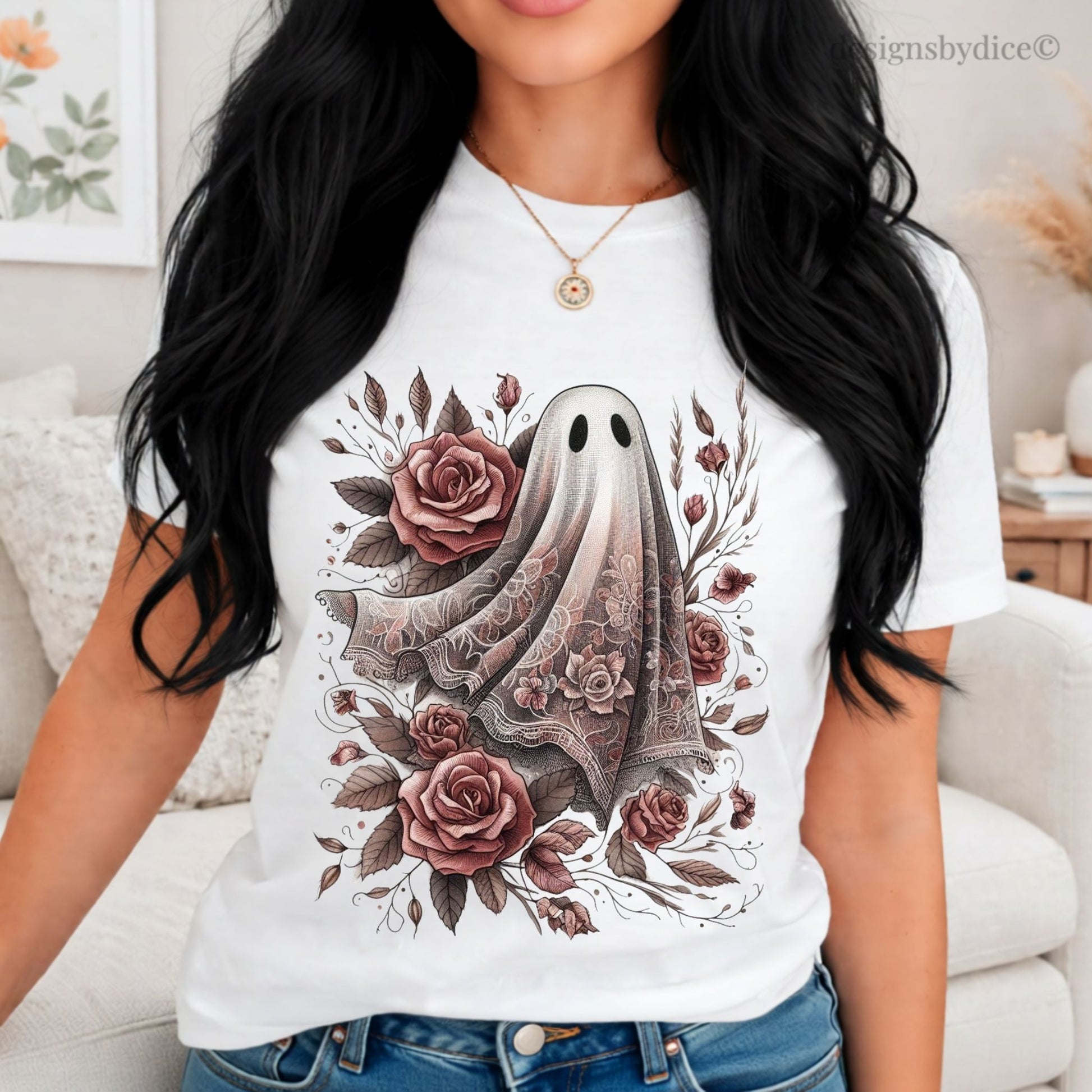 Person wearing a white t-shirt with a ghost and floral design.