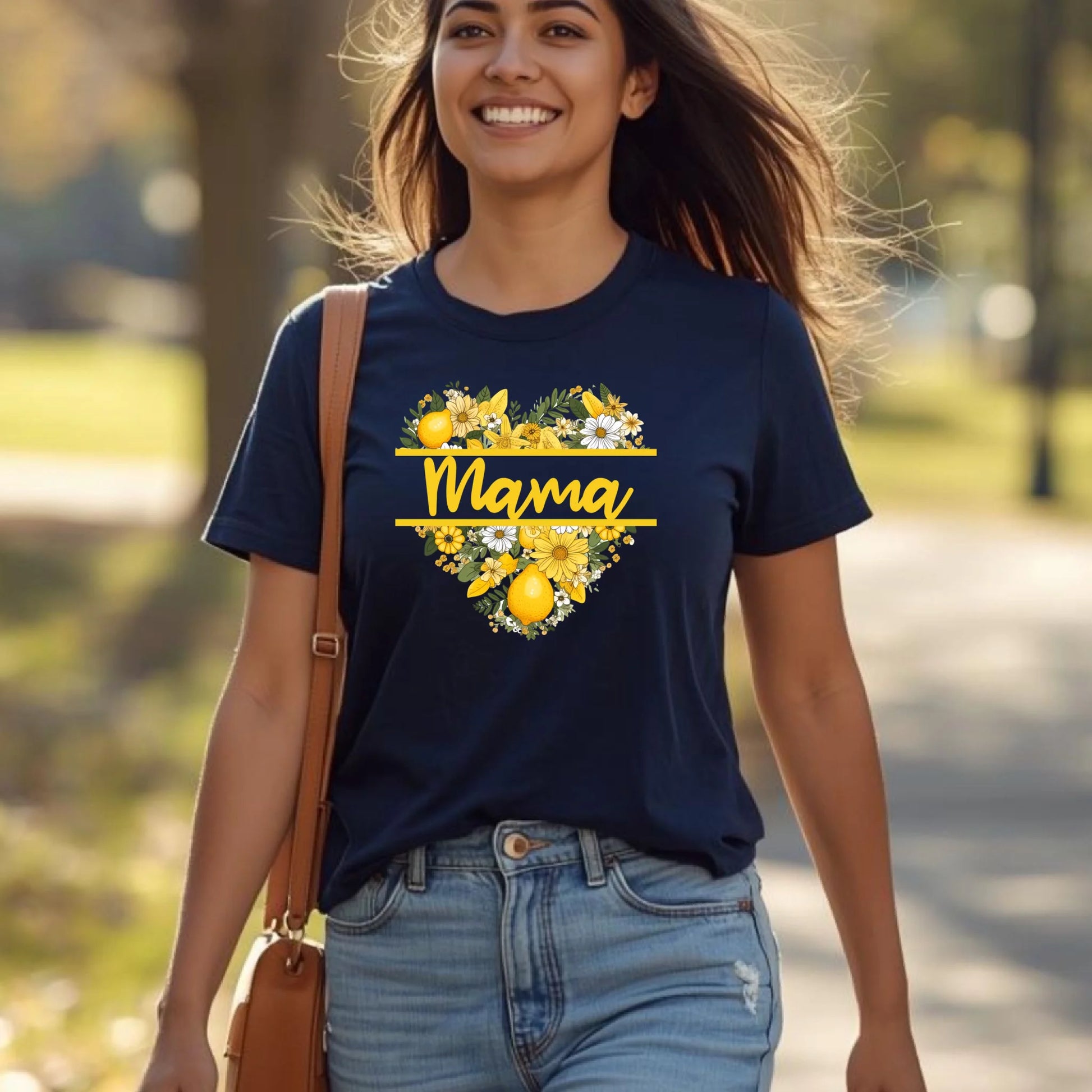 Woman walking outdoors wearing a navy blue lemon floral mama shirt, styled casually for everyday wear.