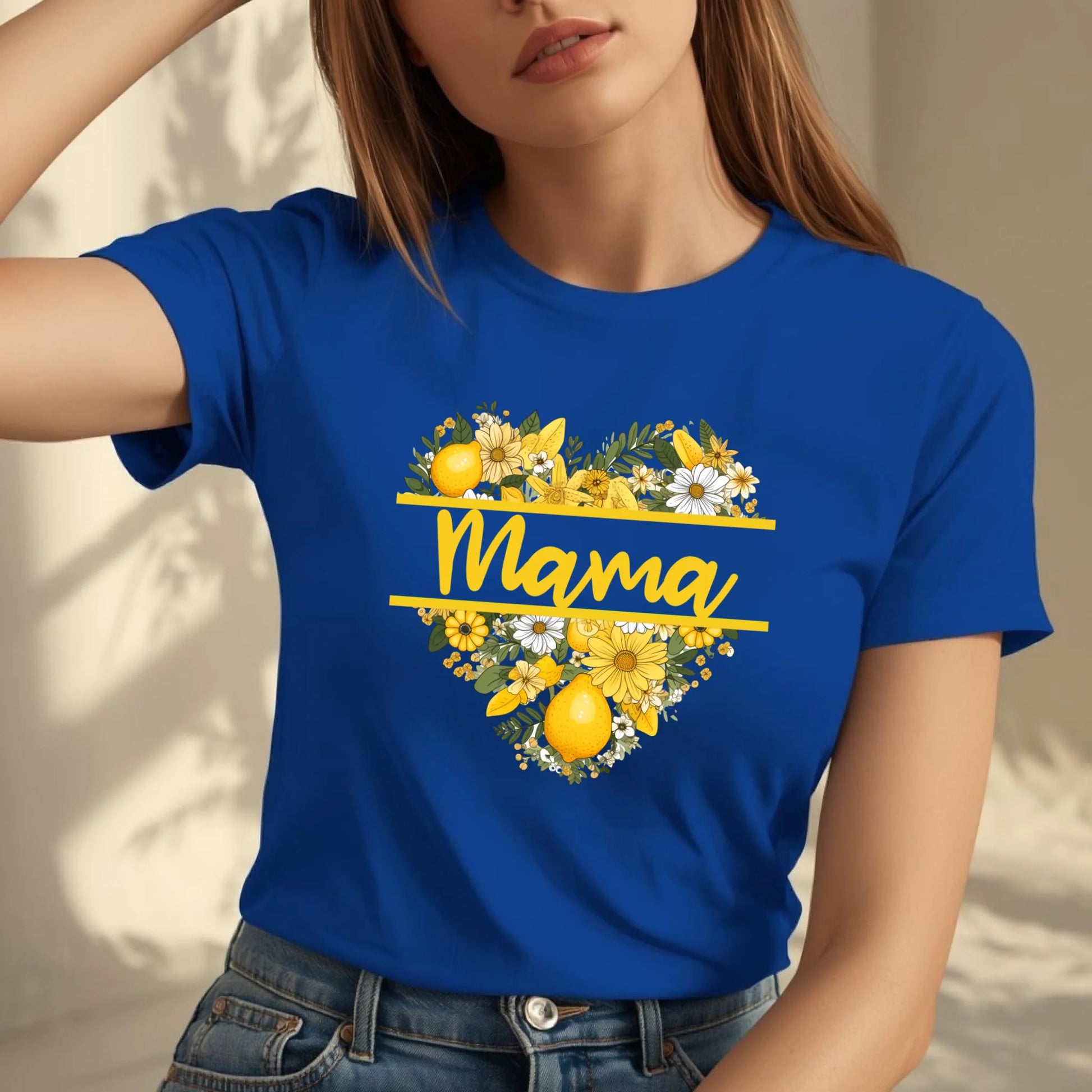 Torso close-up of a royal blue lemon floral mama shirt highlighting the yellow lemon and floral heart design.