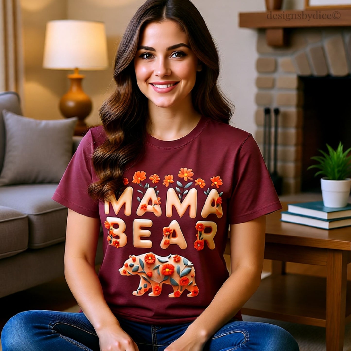 Woman wearing a 'Mama Bear' t-shirt in a cozy living room.