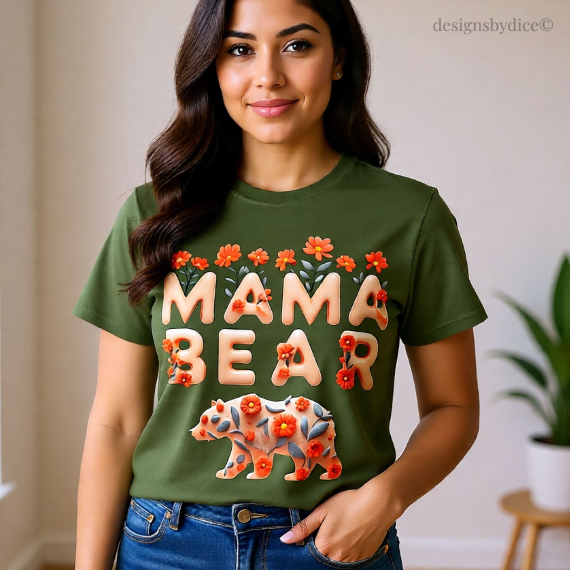 Woman wearing a green 'Mama Bear' t-shirt with floral designs indoors.
