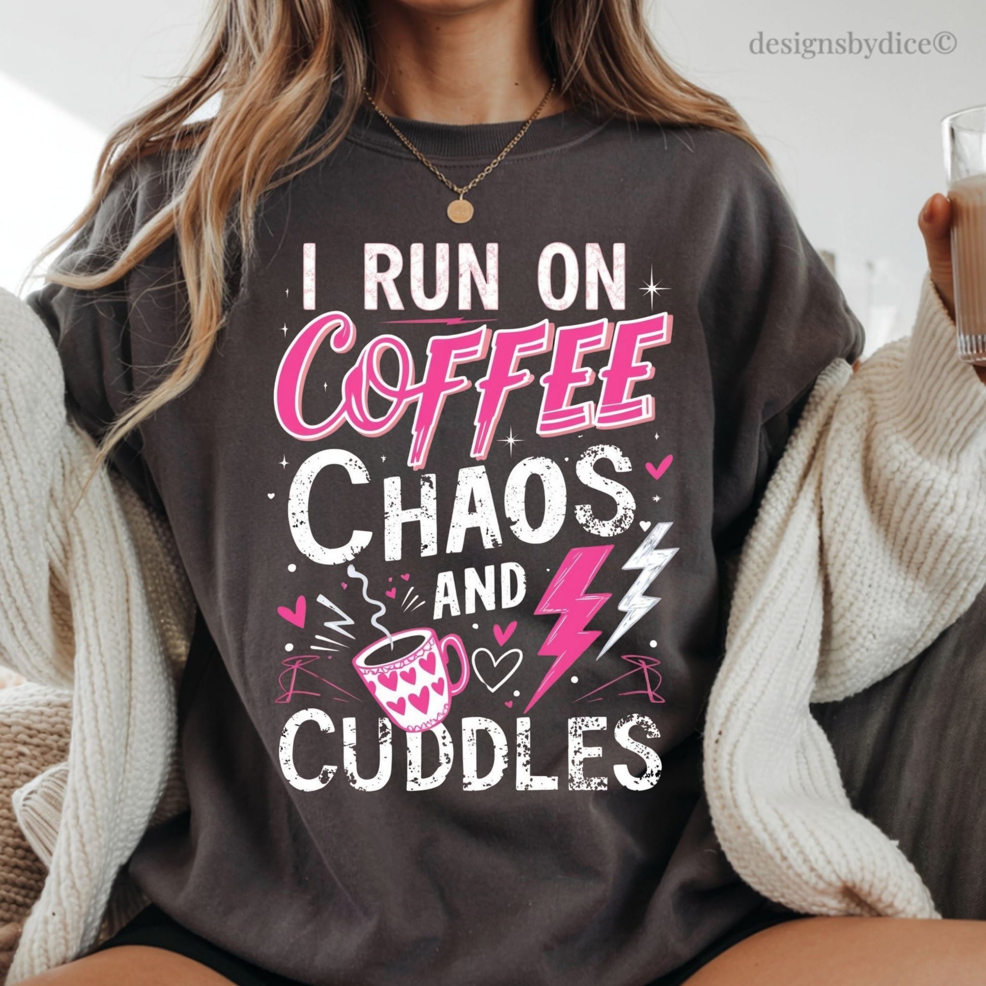 Person wearing a pepper tshirt with 'I Run on Coffee, Chaos, and Cuddles' text and graphics.