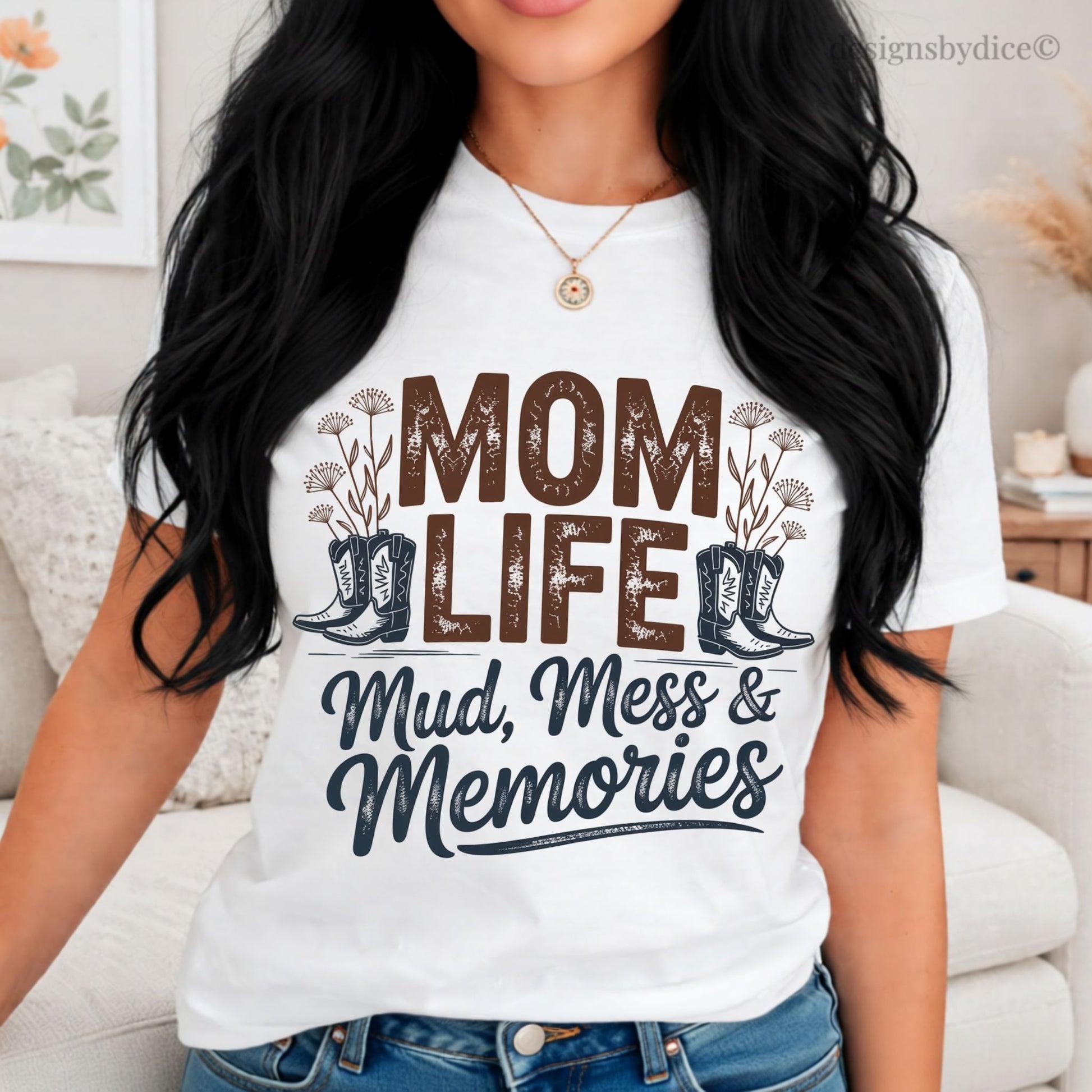 Woman wearing a white t-shirt with 'Mom Life: Mud, Mess & Memories' design.