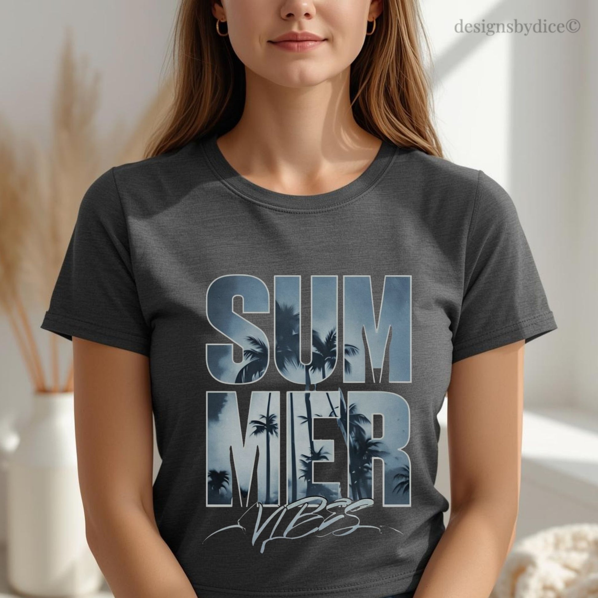 Person wearing a dark gray t-shirt with 'Summer Vibes' graphic design.