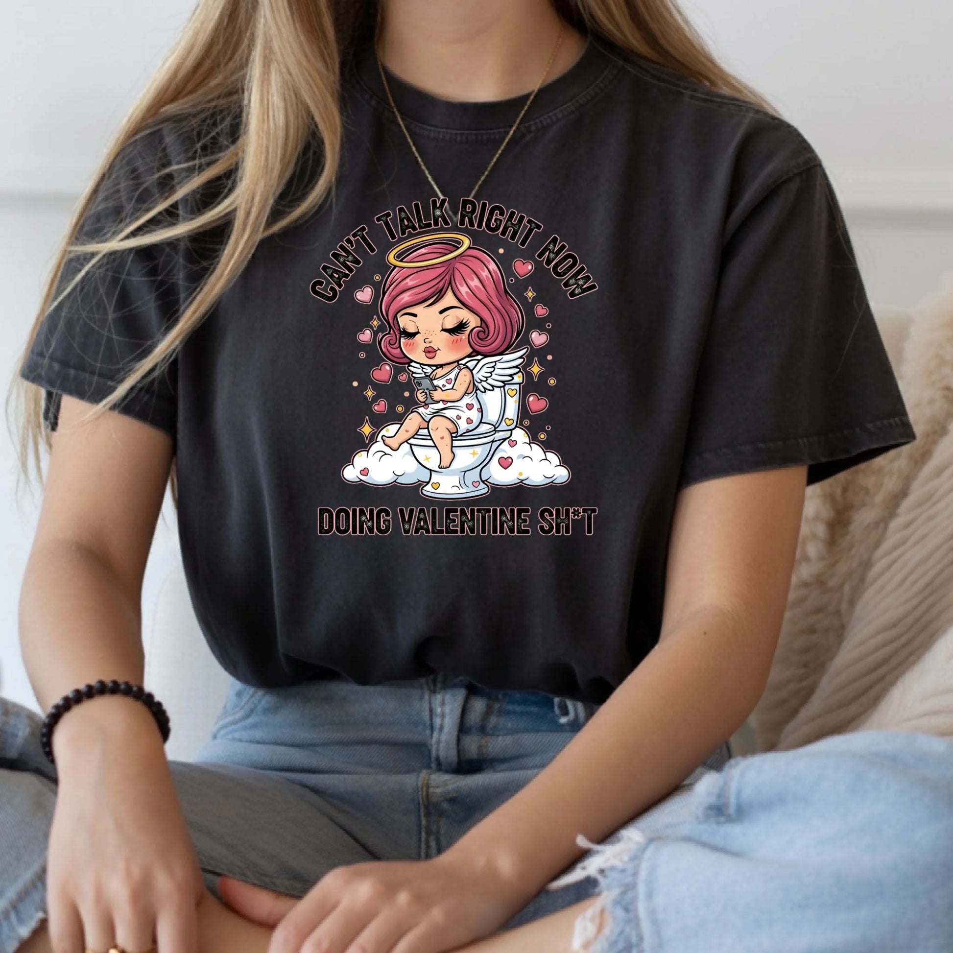 Funny Valentine t-shirt featuring a playful toilet cupid design with sarcastic text, styled in a casual real-life setting.